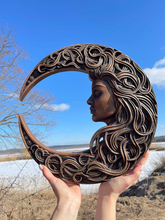 Crescent moon with woman face