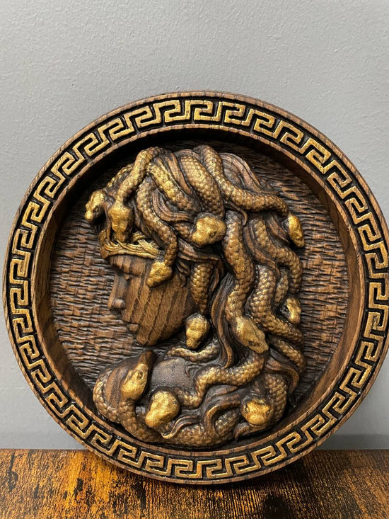 Medusa head Trinacria medallion