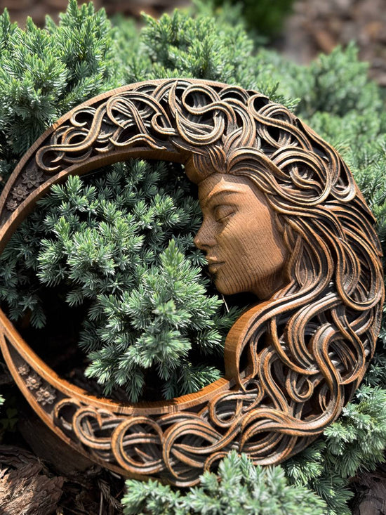 Crescent moon with woman face