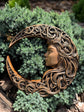 Crescent moon with woman face